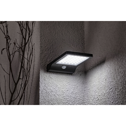 LED Solar Wandleuchte Fassadenleuchte für den Außenbereich mit Bewegungs-Sensor in schwarz | 108 x 190 x 30mm (B. x L. x H.) | 300 Lumen | Kaltweiß (6000 K)